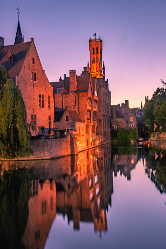 Bruges, Belgium, 21 July 2020: Sunset over the canal in the historic center