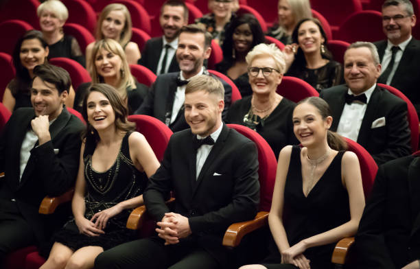 istock Happy audience sitting in opera house 1399536438