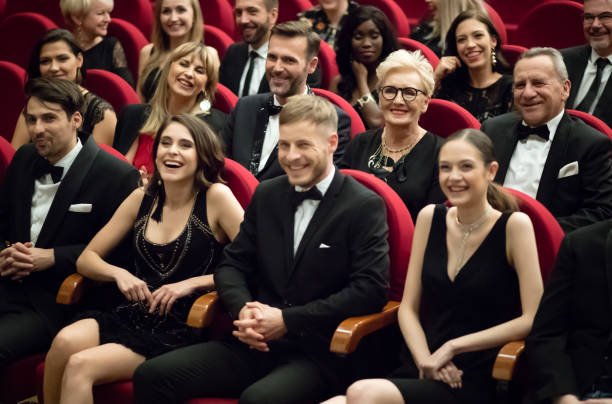 istock Happy audience sitting in opera house 1399536515