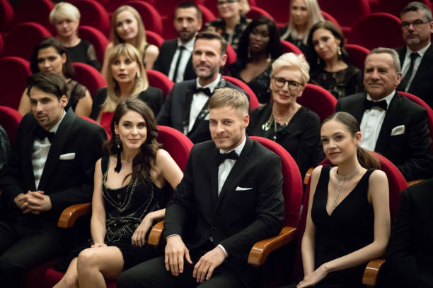 istock Happy audience sitting in opera house 1399536636