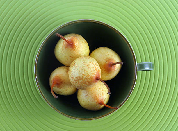 Five tiny pears stock photo