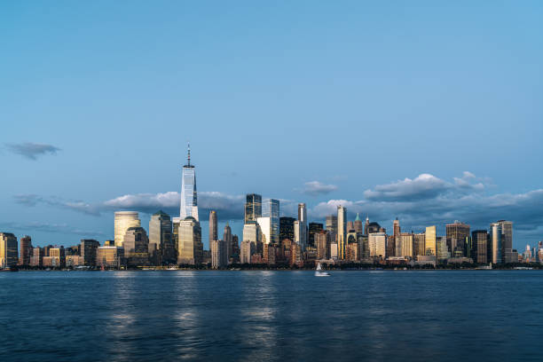 New York city skyscrapers financial downtown and sea panoramic view at sunset stock photo
