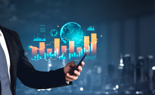 istock Businessman with phone, earth globe and stock market dynamics 1399540724