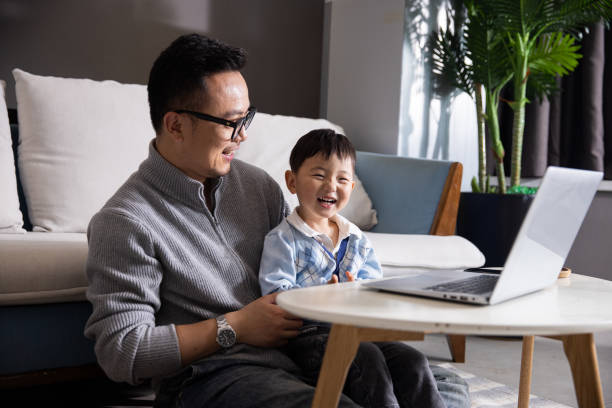istock Father with his son working together at home 1399540894