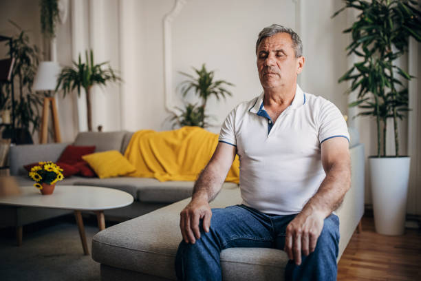 istock The older man relaxes, does yoga 1399542592