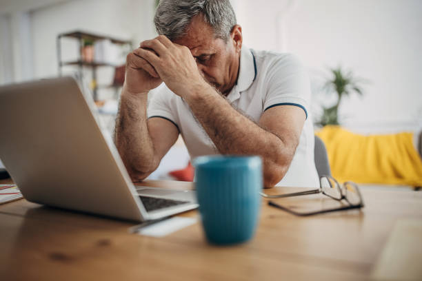 istock Concerned businessman in the office 1399543001