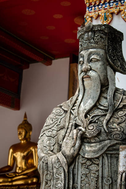 istock Stone guardians at Wat Pho temple, Bangkok, Thailand. 1399544335