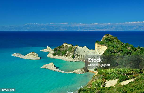 Cape Drastis With Nearby Islands Stock Photo - Download Image Now - Atmospheric Mood, Awe, Bay of Water