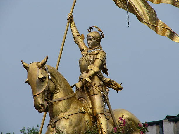 Golden statue of Jeanne d'Arc in Paris on Rue de Rivoli. The statue was made by Emmanuel Fremiet and erected in 1874.