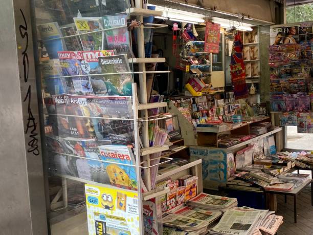 Barcelona, Spain, - May 26, 2022. News paper and magazine kiosk in the city center.