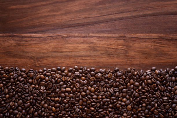 istock Coffee beans on wooden background with copy space 1399547797