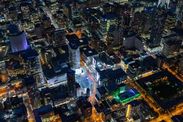 Dundas Square at night Aerial photograph of the iconic square of Toronto called Dundas Square as seen from a helicopter at night toronto dundas square stock pictures, royalty-free photos & images