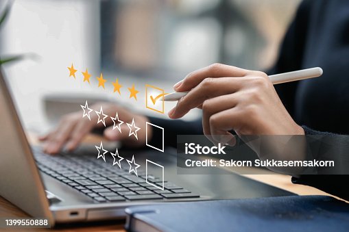istock Businessman typing on a computer keyboard, customer service satisfaction survey concept. Business people choose the highest satisfaction rating and give 5 stars. Satisfaction, rating, rating. 1399550888