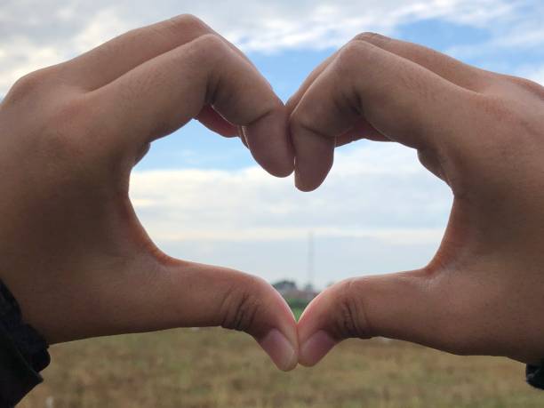 istock photo of hands that make up love 1399551091