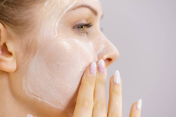 istock Girl apply cream cosmetic 1399551195