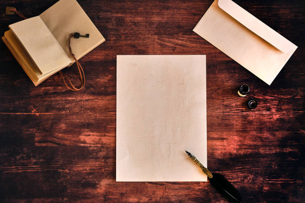 istock Flatlay with a letter on a wooden table 1399552444