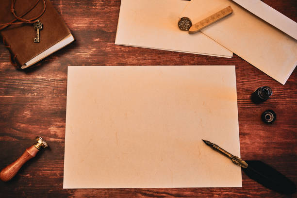 istock Flatlay with a letter on a wooden table 1399552505