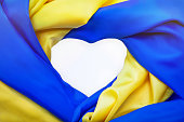 National flag of Ukraine in form of heart. Top shot, copy space.