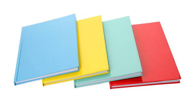 istock Different colorful hardcover planners on white background 1399557420