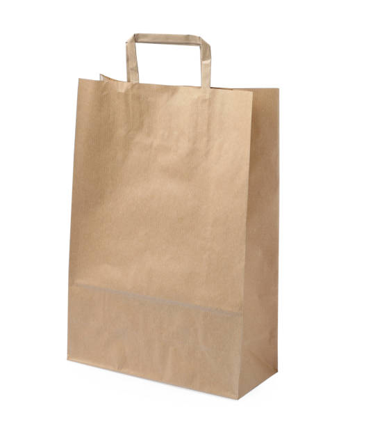 istock Kraft shopping paper bag isolated on white 1399558663