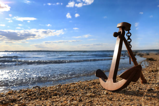 istock Wooden anchor near river on sunny day 1399558681