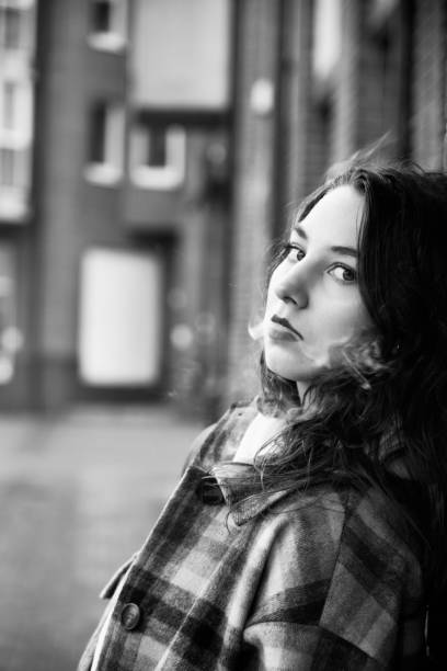 istock young woman smoking 1399558710
