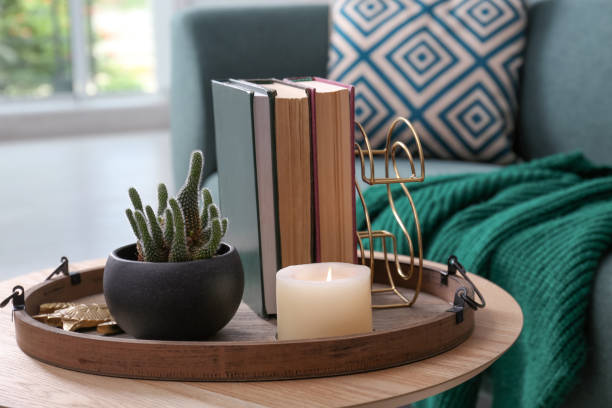 istock Stylish tray with different interior elements on wooden table in room 1399558722