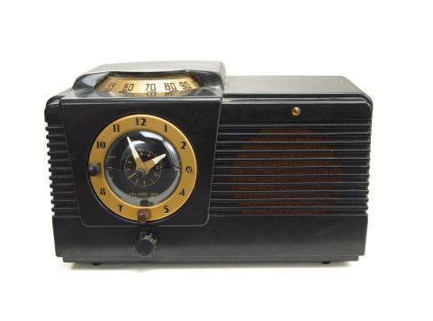 Wood Retro broadcast table radio receiver .