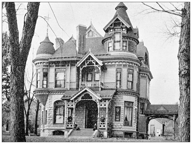 Antique photograph from Lawrence, Kansas, in 1898: Residential building, exterior Antique photograph from Lawrence, Kansas, in 1898: Residential building, exterior lawrence kansas stock illustrations