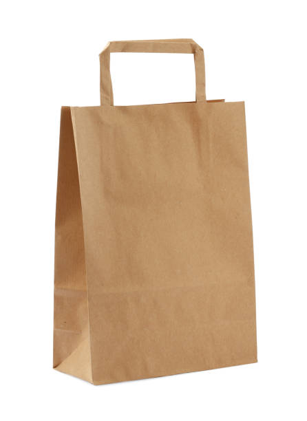 istock Kraft shopping paper bag isolated on white 1399559412