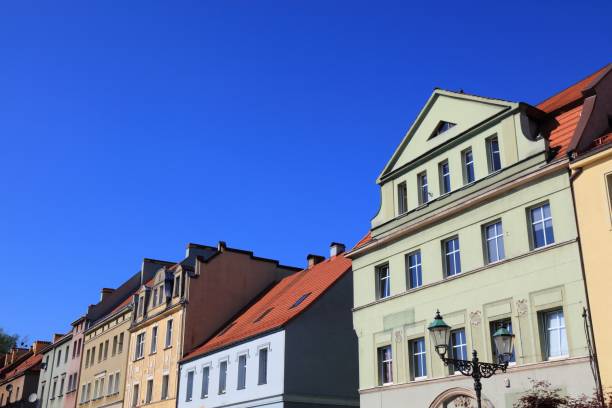 pink, yellow and red facaded townhouses