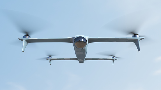 Combat reconnaissance drone in flight close-up. Waging war in modern realities. Artillery aiming with drones