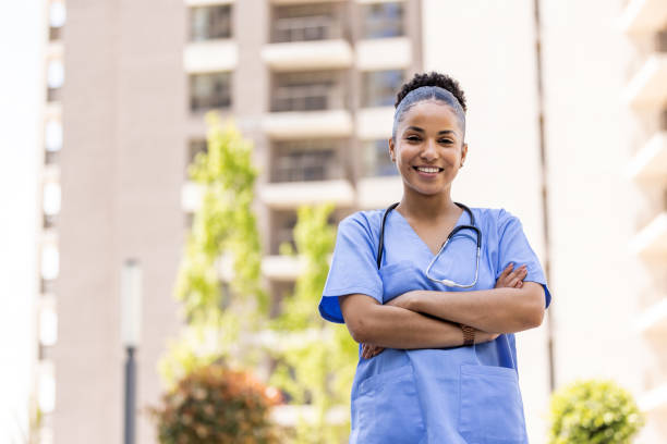 istock Attractive caregiver therapist practitioner looking at camera. 1399562471