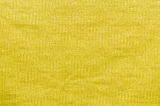 Wrinkled bright yellow knitted fabric for the background