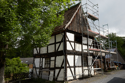 Herdringen, NRW, Germany, 27 05 2022, half-timbered house with scaffolding for renovation work