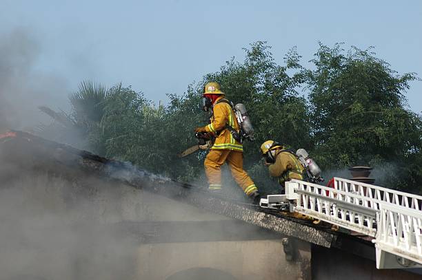 Fire fighter at work 2 stock photo