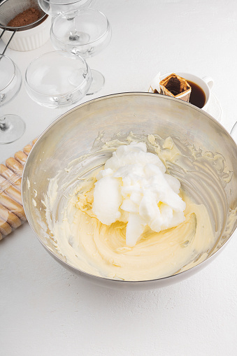Recipe for a delicious tiramisu cream on a white background