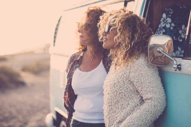 istock Friends Standing By Camping Van 1399568865