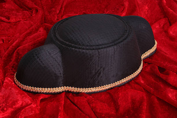 Matador hat and red cape stock photo