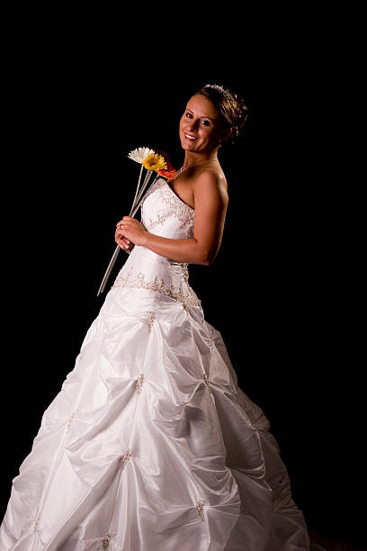 istock Happy bride with flowers on black background 139957606