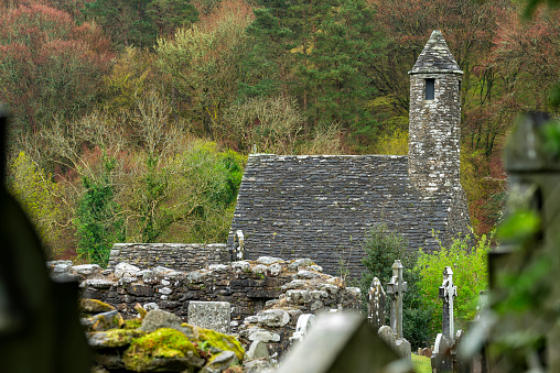 View of the cemetery and ruins of St. Kevin's monastic medieval city in Glendalough in Wicklow county Ireland.