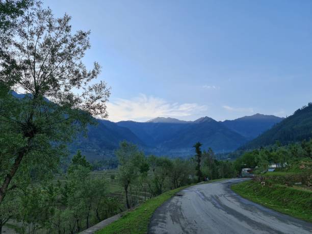 istock scenery on a sunny day with clouds on the sky 1399578617