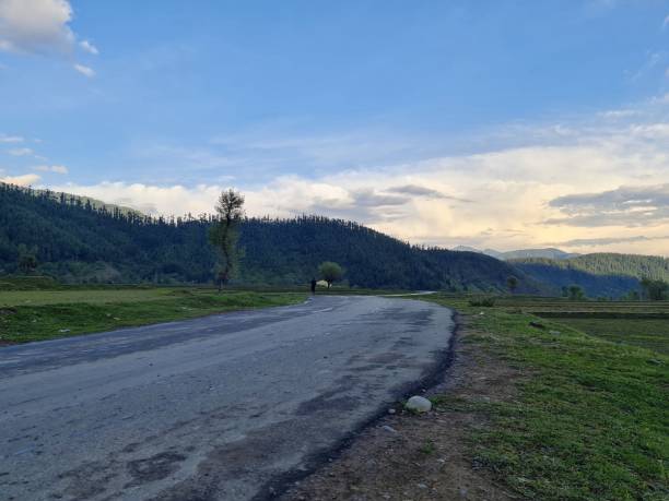 istock scenery on a sunny day with clouds on the sky 1399578674