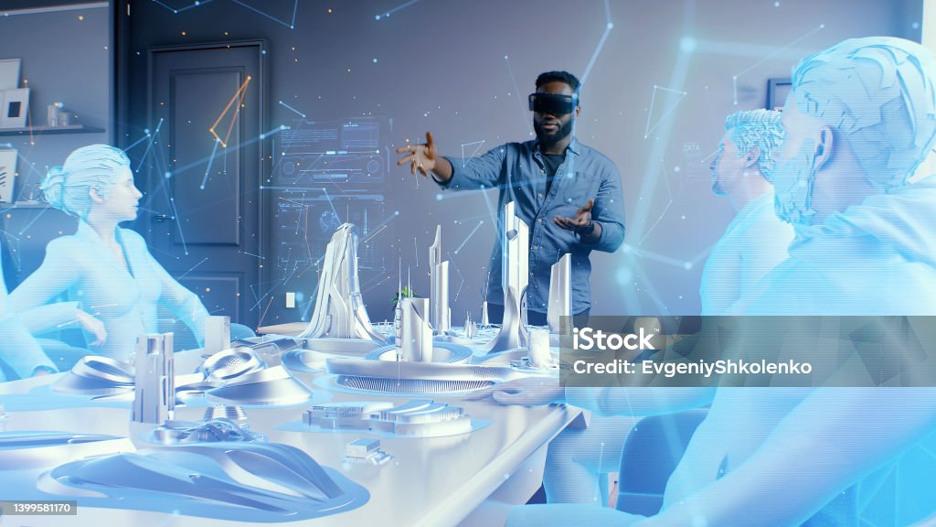 Man in cyberspace of meta universe discussing architectural project A man wearing vr glasses in the cyberspace of the meta universe at an online meeting, discussing a holographic 3D architectural design of a futuristic sustainable city of the future. Metaverse Stock Photo