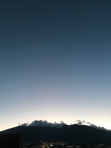 Andes' Highland with Cayambe, Cotopaxi and Pichincha's Volcanoes view from Quito, Pichincha Province, Ecuador, South America at the sunrise.