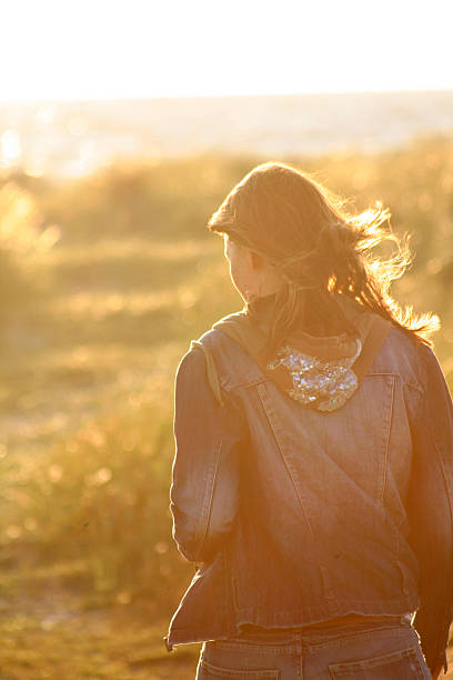 girl in the sun stock photo