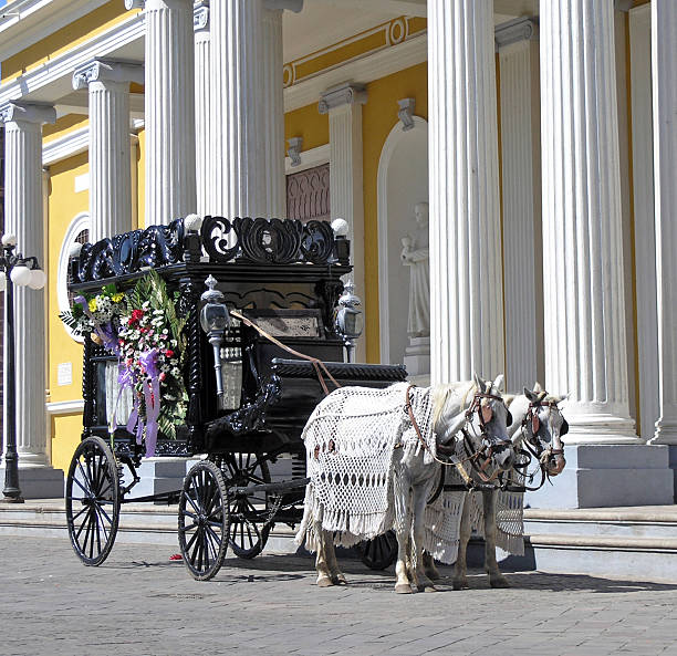 a old black hearse wagon