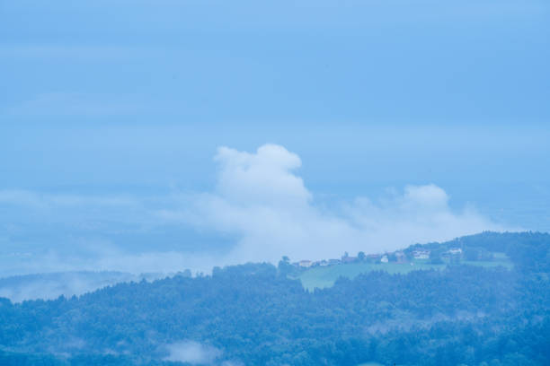 Landscape photos in the Bavarian Forest with fascinating clouds and blue sky