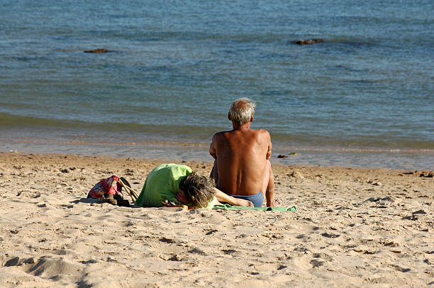 istock Old couple staring at the sea 139958854