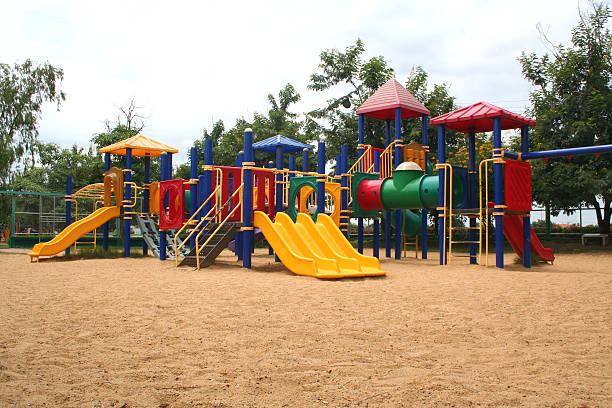 istock Playground with colorful equipment on sand 139959048